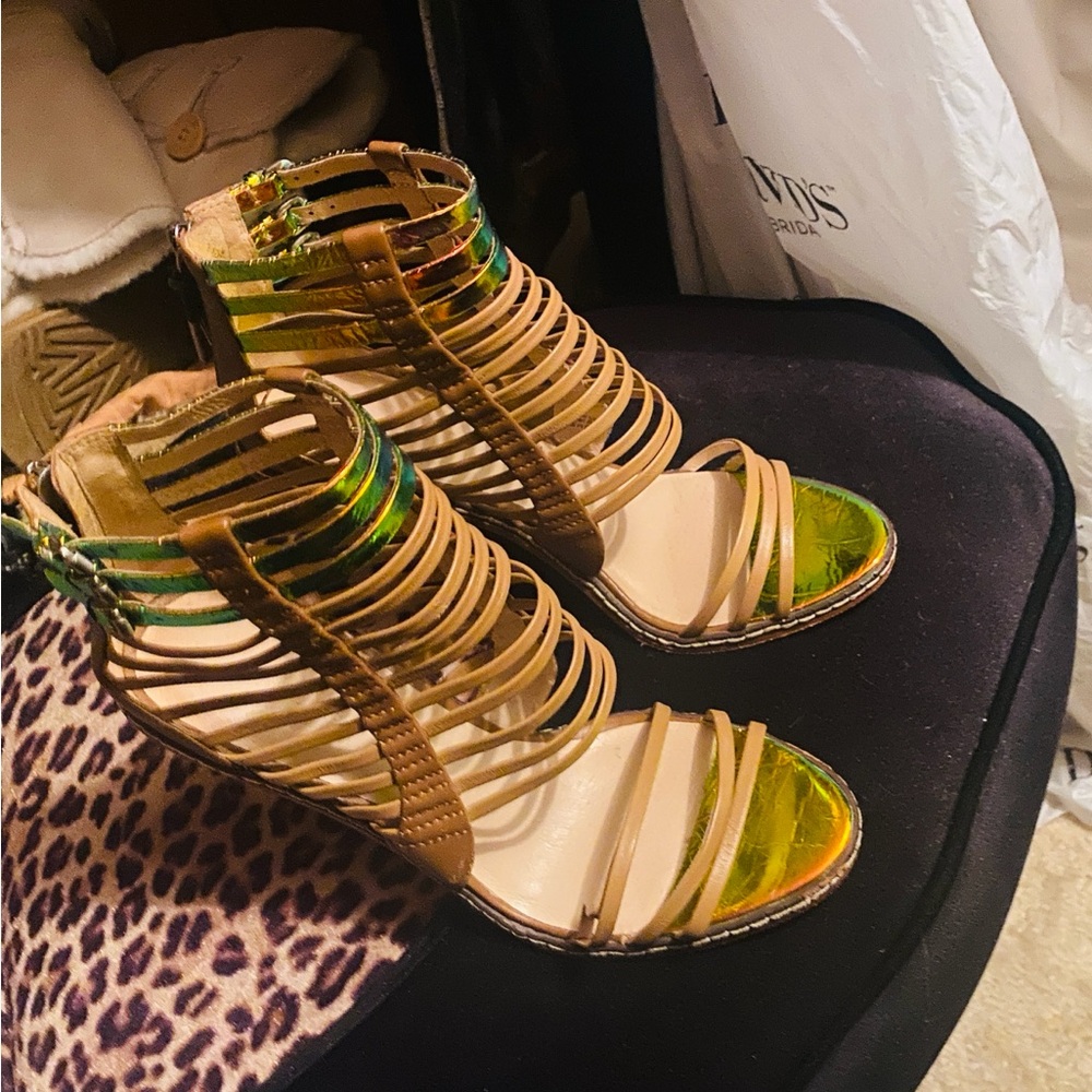 Strapped leather heels